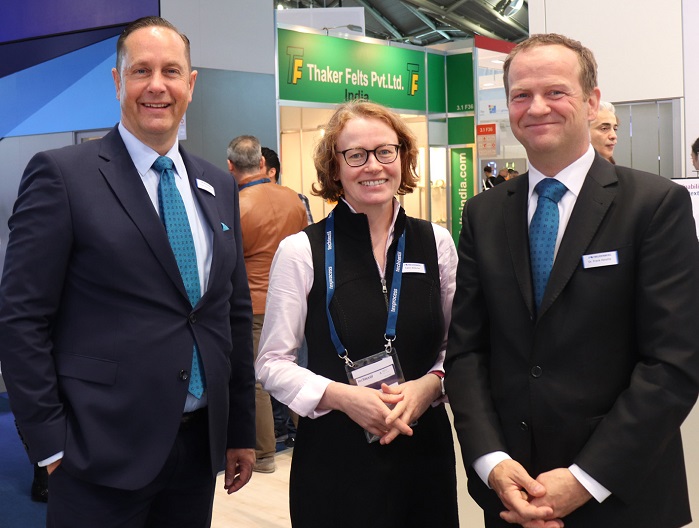 Pictured at Techtextil 2019 in Frankfurt is Dr Heislitz (right) with Freudenberg Performance Materials head of global communications Holger Steingraeber and media relations manager Katrin Böttcher. © Adrian Wilson