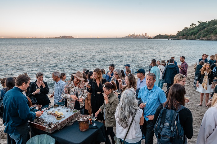 Guests mixed and mingled on Angel Island while enjoying locally sourced seafood. © Russ Levi Photography