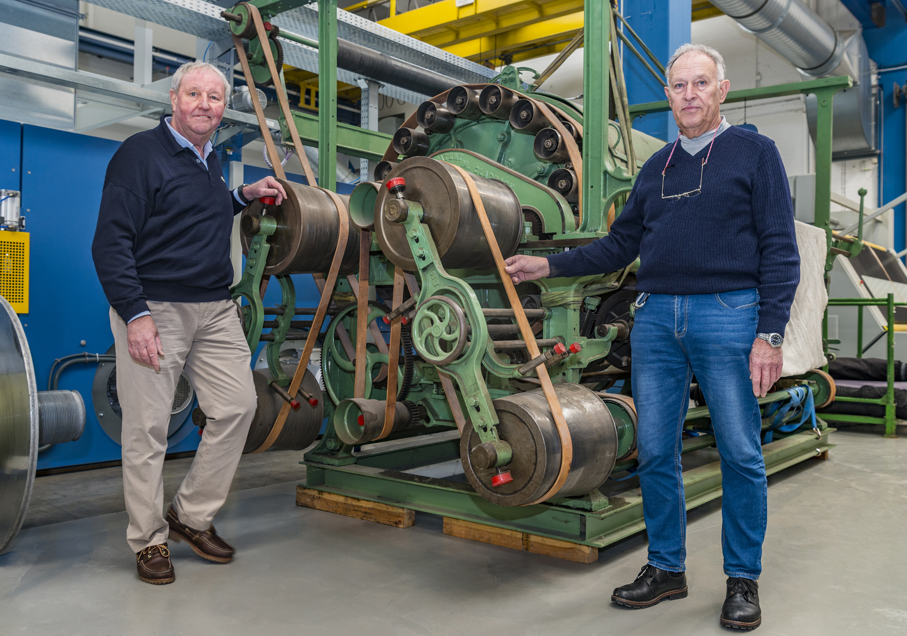 Fred Vohsdahl (left) and Walter Dresen with the103-year-old Monforts machine. © Monforts.