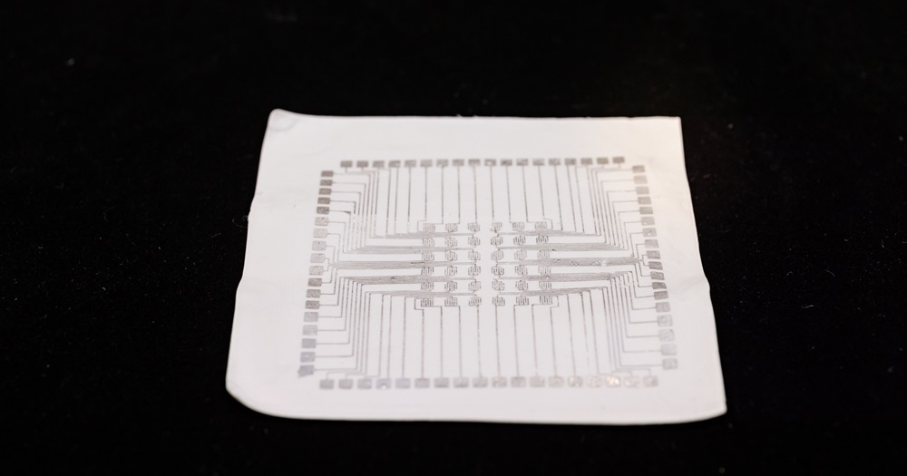 The conductor is fabricated by coating or printing liquid-metal onto an electrospun elastomeric fibre mat. © Hong Kong PolyU