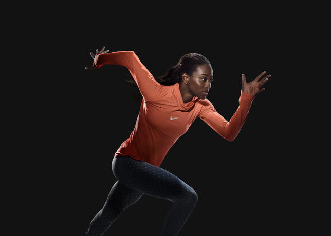 Wearing the women's Nike AeroReact Pullover Top is English Gardner: World Championships Silver Medalist, 4x100m
