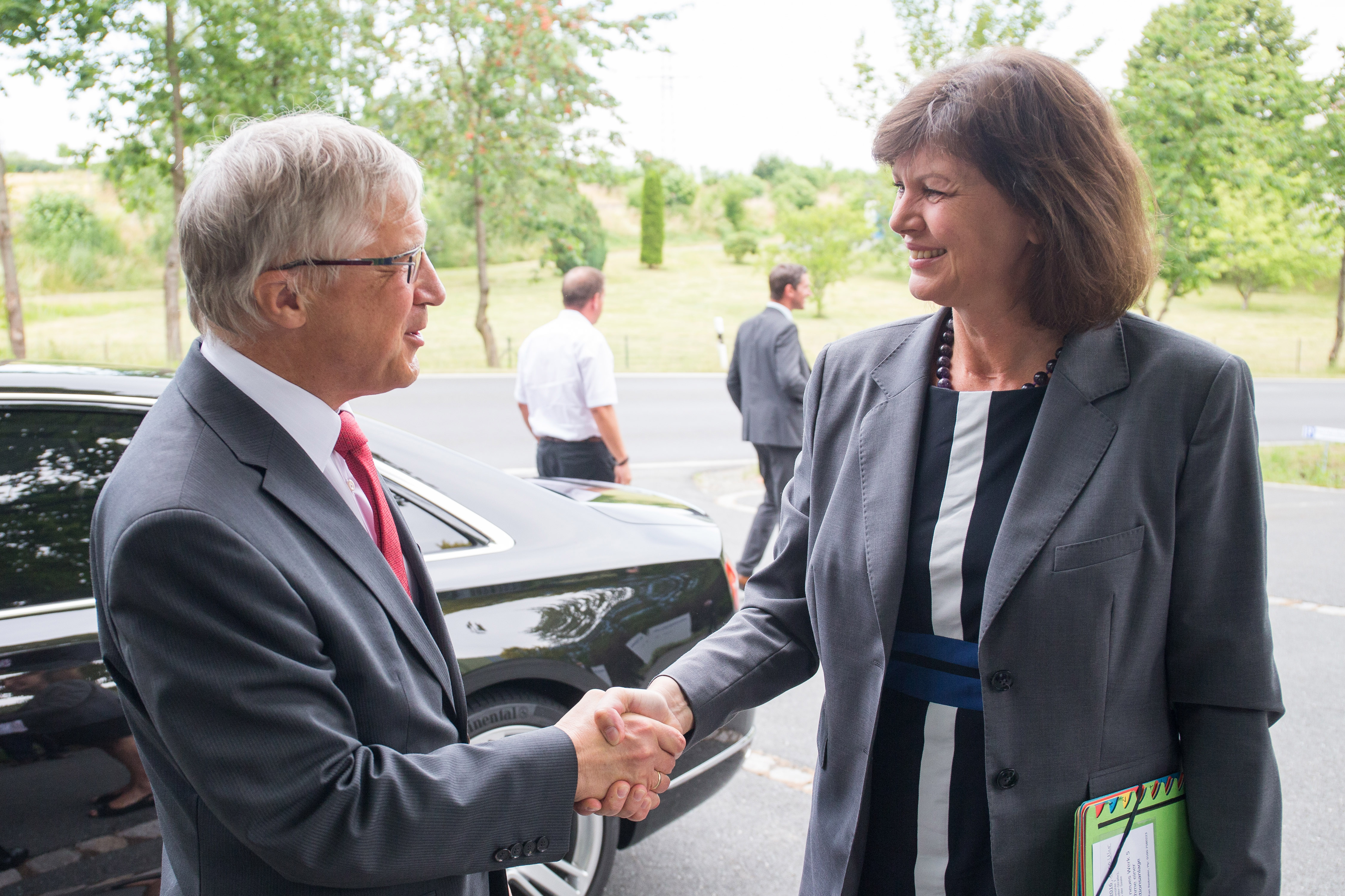Sandler AG. Dr. Christian Heinrich Sandler (left) welcomes State Minister Ilse Aigner