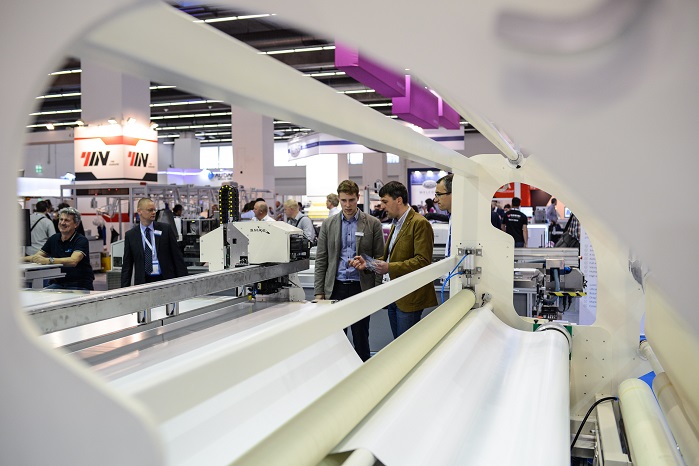 Cutting machine, developed for high-speed continuous cutting of patterns or series of patterns of infinite lengths in flexible PVC, at Texprocess 2017. © Messe Frankfurt Exhibition GmbH / Pietro Sutera