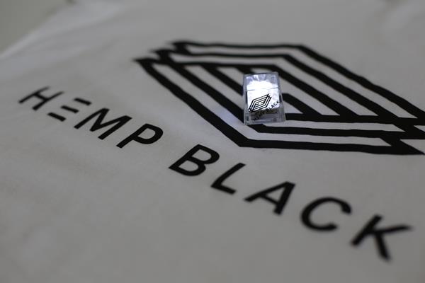 Hemp Black Shirt with cube lighting to show how the pigment can be conductive and used for printing. © Hemp Black.