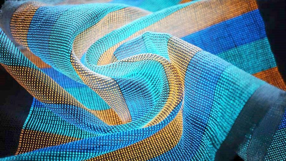 Largearea display textile integrated with functional systems