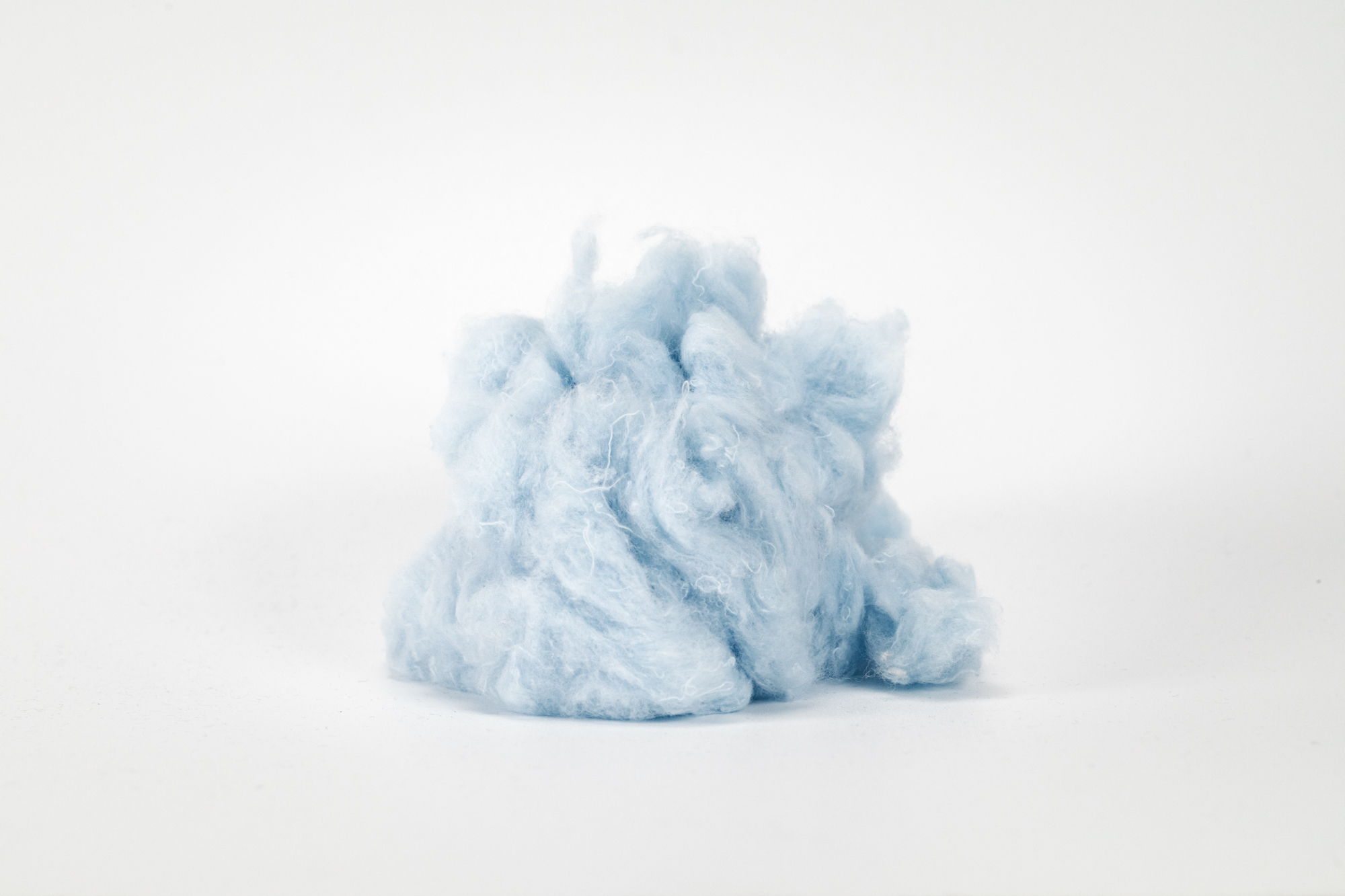 Fibres recycled from post-industrial and post-consumer cotton waste.