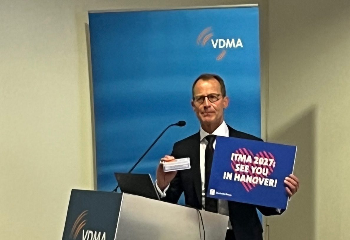 Janpeter Horn, chairperson of Germany’s VDMA association celebrates the next ITMA show secured for Hanover in 2027. © A.Wilson