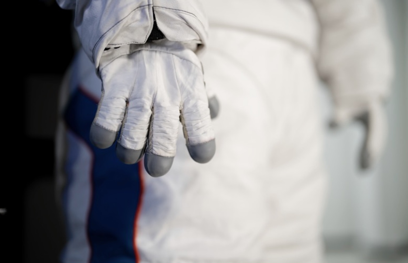 The new AxEMU custom glove design will enable astronauts to work with specialized tools to accomplish exploration needs and expand scientific opportunities. © Axiom Space