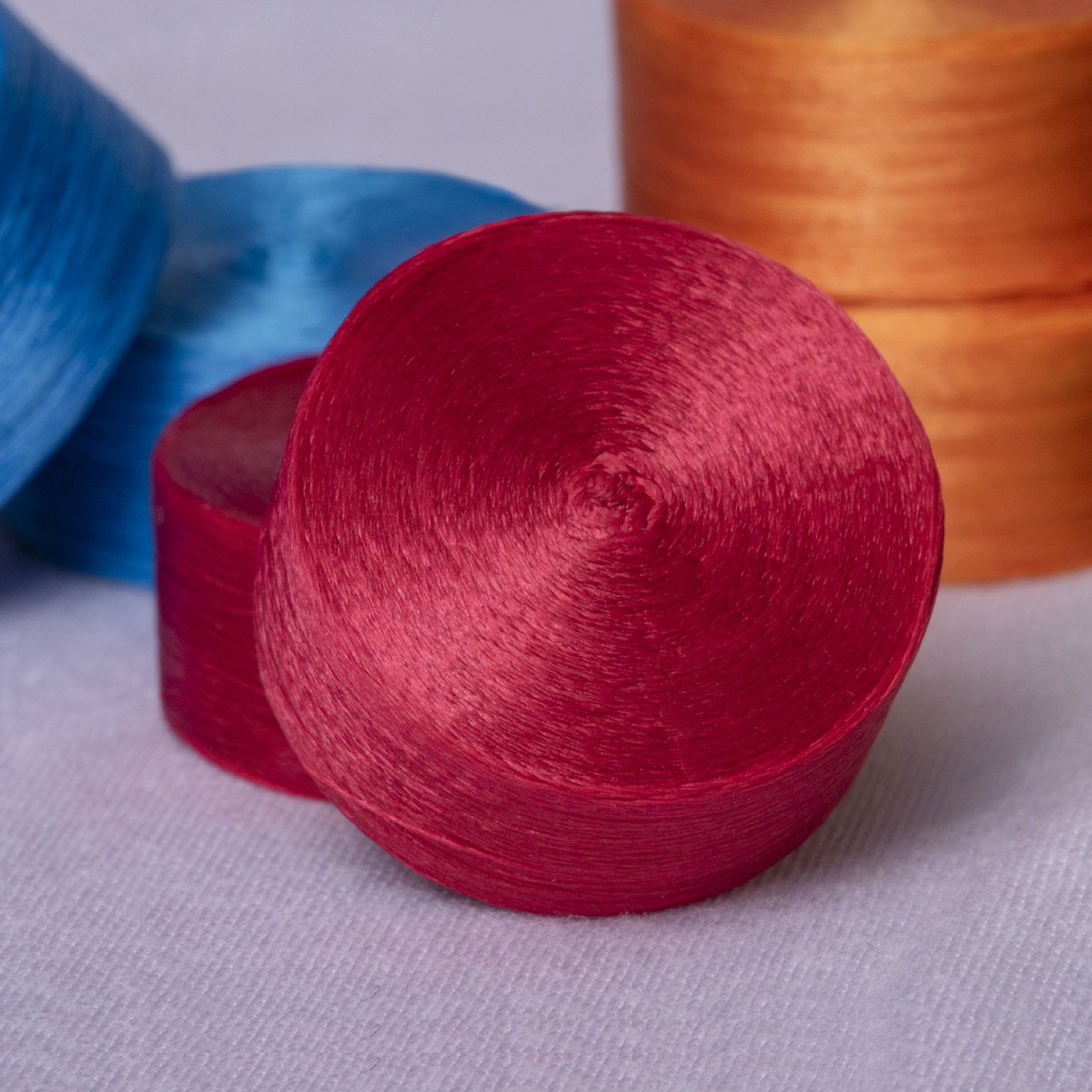 Duma centreless pre-wound under-bobbins hold more yarn to significantly reduce machine down times. © Durak Tekstil