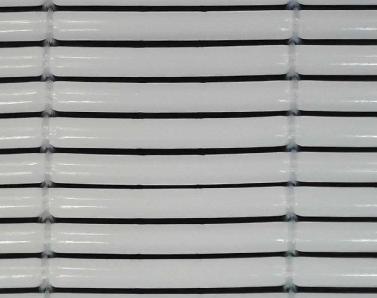 The fibres are positioned in an ordered arrangement, held in place by the way the loops interlock rather than by force. © Karl Mayer