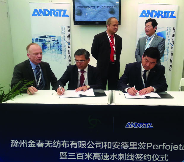 Signing of the contract during the ShanghaiTex exhibition. Front row (from right to left): Cao Songting, Executive Director of Chuzhou Jinchun Non-woven Fabric; Rakesh Kumar, Managing Director of Andritz Wuxi, and FrÃ©dÃ©ric NoÃ«lle, R&D Manager of Andritz Perfojet; back row (from right to left): Gao Huaizhong, Secretary of Chuzhou Langya District Committee of the Chinese Communist Party; Wang Tu Qiang, Vice Mayor of the People’s Government of Chuzhou. © Andritz