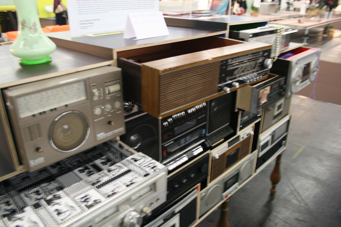 “My favourite was the striking storage cabinet constructed from hollowed-out old music players pictured. Tape decks, ghetto-blasters and CD consoles – all of which are largely obsolete music delivery systems these days – served to underline the transitory nature of many household goods over the past thirty years.”