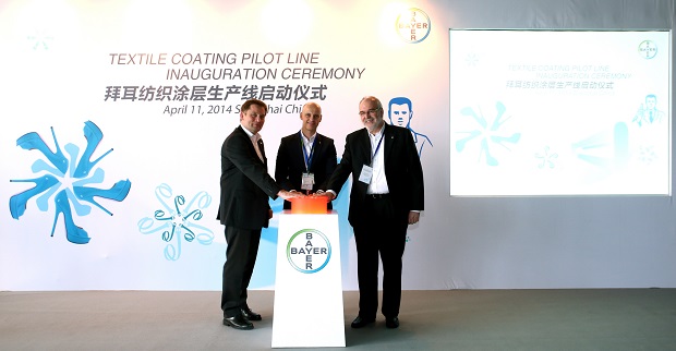 Inauguration of the new pilot plant for textile coating (from left to right): Dr Christian Haessler, Head of the Polymer Research & Development Center of Bayer MaterialScience in Shanghai, Nicholas Smith, Global Head of Textile Coating, and Rolf Irnich, Global Head of Application and Technology Development for Textile Coatings. © Bayer MaterialScience AG