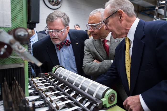 Vice President and Orion programme manager for Lockheed Martin space systems company Mike Hawes, left, NASA Administrator Charles Bolden, centre, and Bally Ribbon Mills (BRM) President Ray Harries. © NASA