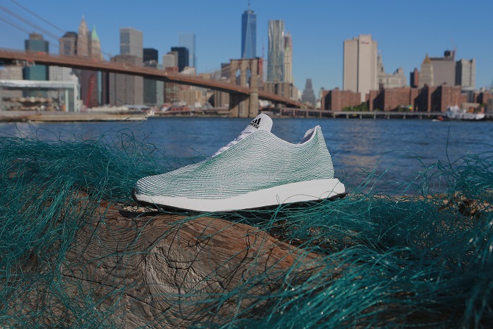 Adidas created a shoe upper made entirely of yarns and filaments reclaimed and recycled from ocean waste and illegal deep-sea gillnets. © adidas 