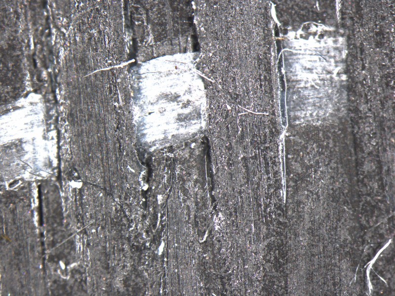 Close-up of a carbon-fibre structure exposed by microbiological degradation. The researchers are now planning a project specifically to develop recycling methods using microorganisms. © Hohenstein Institute