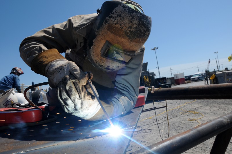 Welders' protective clothing needs not only to provide effective protection from splashes of molten metal but also to be comfortable to wear. © wikipedia.org (Author: PO3 Patrick Kelley)