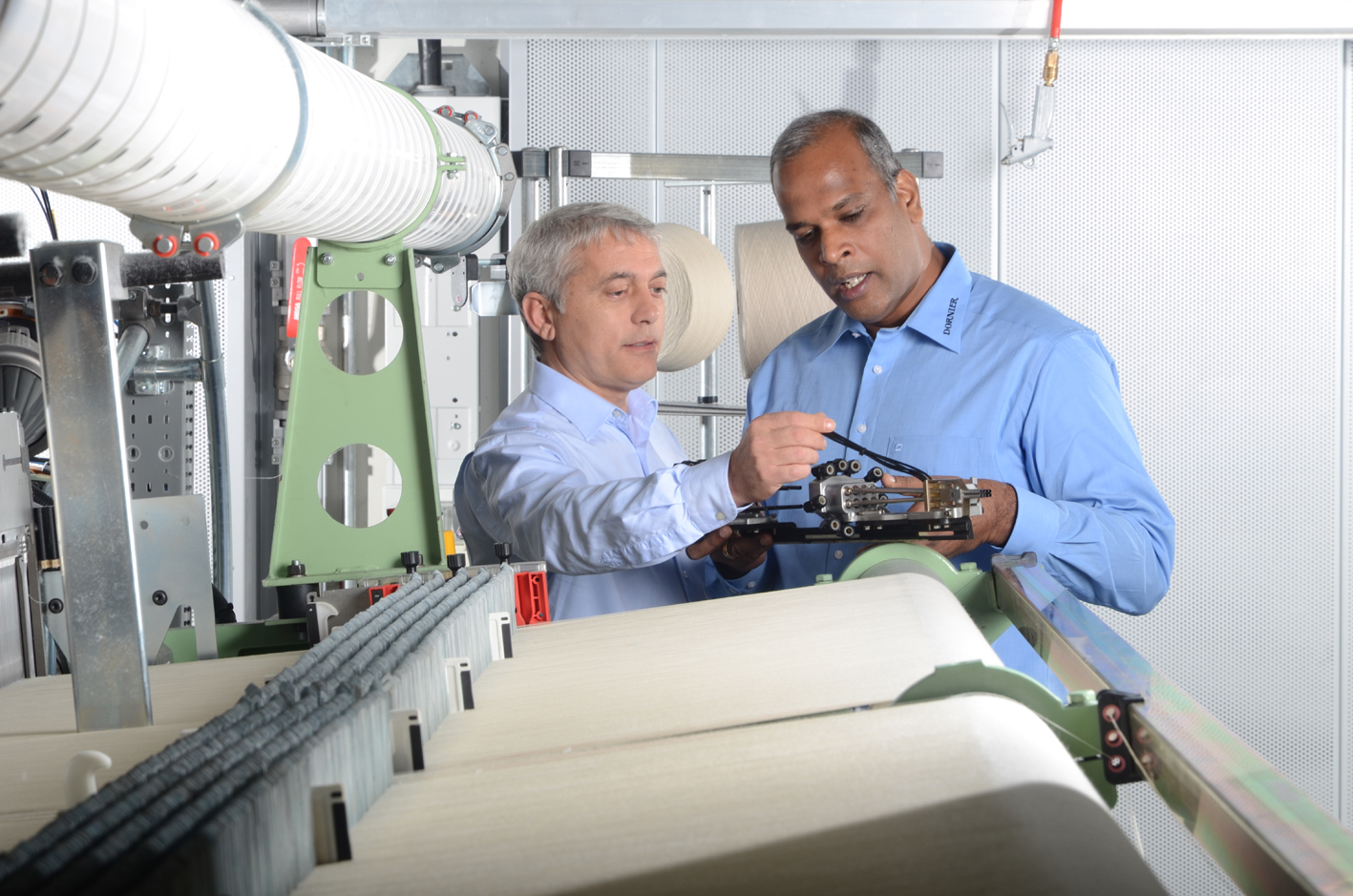 It is estimated that 60% of all woven carbon and aramid fabrics are woven on the weaving machines built at Lindauer Dornier’s plant. © Lindauer Dornier