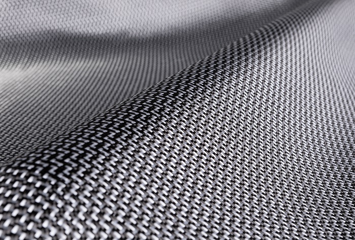Dyneema Carbon can help improve the performance of sports and automotive motorsports products that currently rely on pure carbon composites. © DSM Dyneema