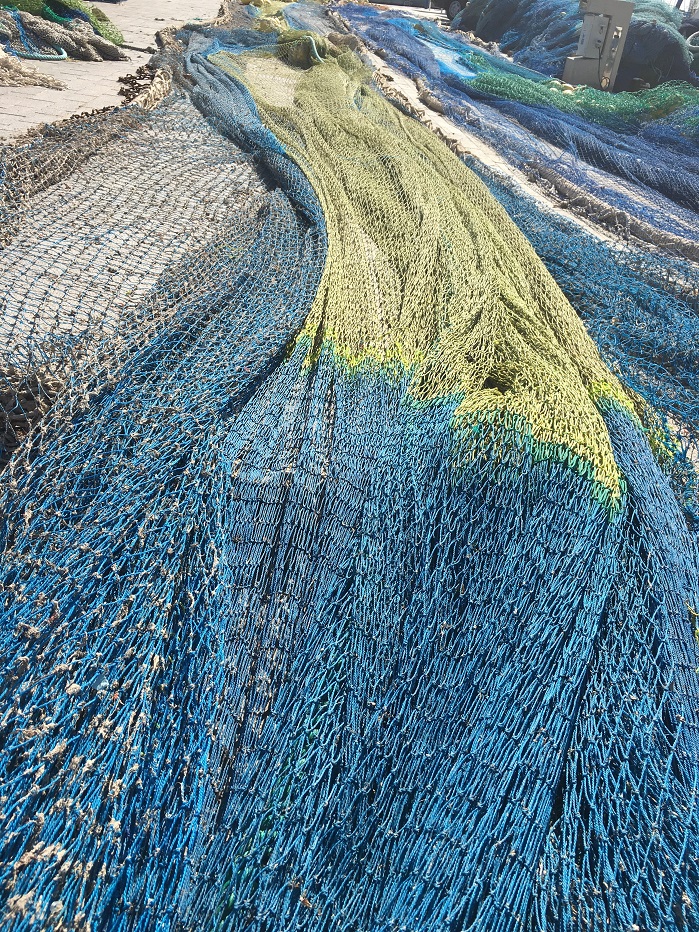 The raw material for the yarn comes from old fishing nets. © Grosz-Herzig / Carpet Concept