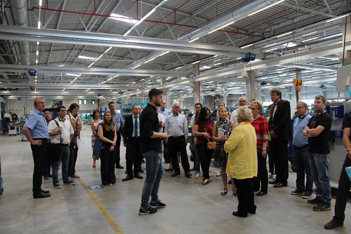 Guests are shown around the around the new assembly hall. © Karl Mayer