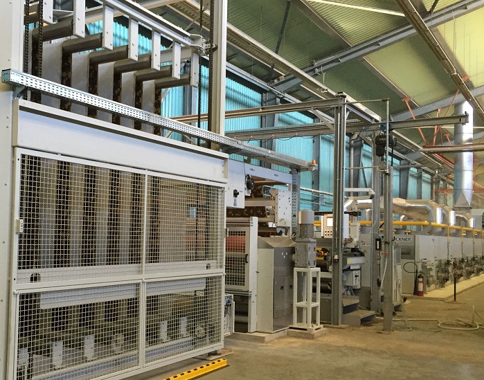 View of the roller accumulator and the coating and laminating line. © Brückner