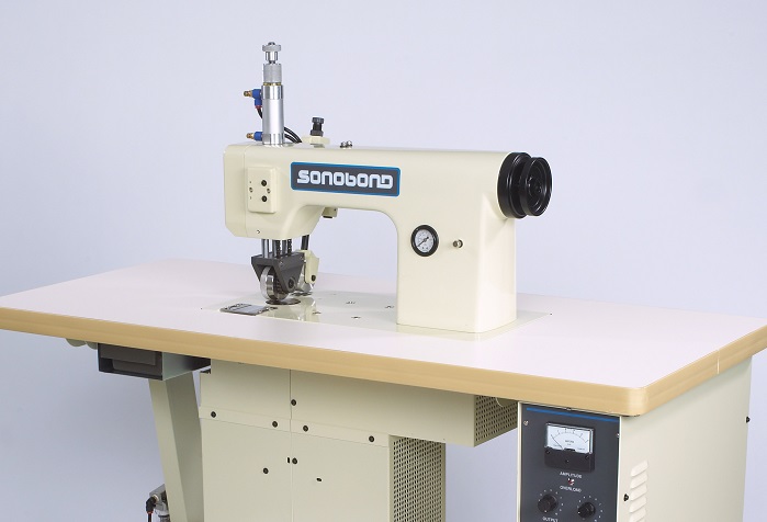 Although Sonobond’s SeamMaster High Profile Ultrasonic Sewing Machine resembles a conventional sewing machine, it employs ultrasonic vibrations – instead of needles, thread, glues or other adhesives. © Sonobond Ultrasonics