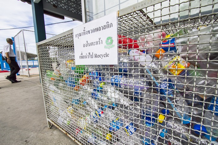 Collection point with transparent PET bottles. © Trevira