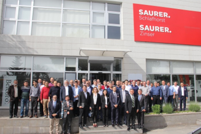 The Saurer team outside the service station in KahramanmaraÅŸ. © Saurer