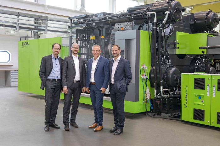 From left to right: Dr Norbert Müller, head of the Engel Technology Centre for Lightweight Composites, Dr Michael Emonts managing director of the AZL, Rolf SaÃŸ, general manager of Engel Deutschland and Dr Christoph Steger, Engel’s chief sales officer. © AZL