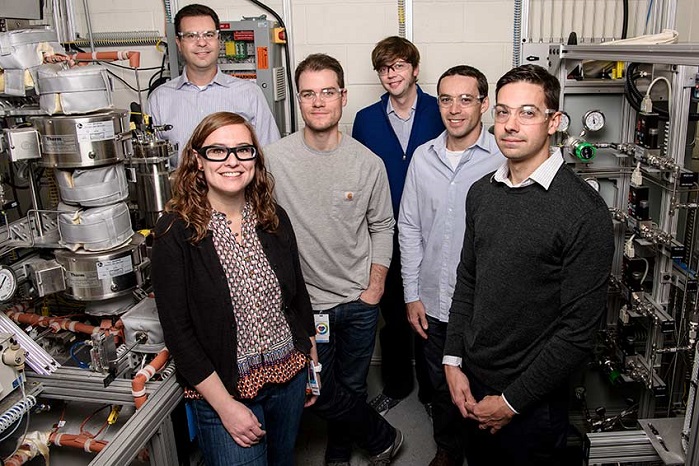 NREL researchers (from left) Adam Bratis, Violeta SÃ nchez i NoguÃ©, Todd Eaton, Gregg Beckham, Vassili Vorotnikov, and Eric Karp all worked to make renewable acrylonitrile a reality. © Dennis Schroeder, NREL